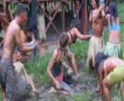 Using the Paw Paw as a ball, this Amazonian tribe, Katukina, play a great game of mud-fest-tackle-for-the-ball, Ladies Vs Fellas.