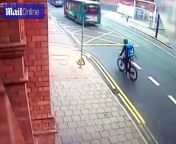 Joseph Nicholson, 24, was cycling on Westgate Street in Cardiff when he slipped on a wet patch of road and fell from his bicycle. The Just Eat delivery driver is seen stumbling into the path of an oncoming bus.