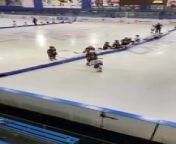 Junior ice hockey players clash
