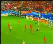 Russia and Spain are showing an impressive soccer game at the Euro 2008 semifinal in Vienna. The first half is over and the two soccer teams are taking a little rest after playing 45 minutes under pouring rain.r side.
