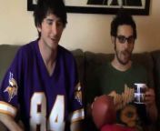 Two guys watching football and penis