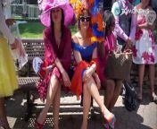 Droves of people descended on Louisville on Saturday, busting out the crazy outfits and big hats for the 143rd annual Kentucky Derby.en