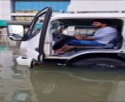 Flooded road in Sharjah from road head in car