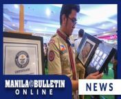 Boy Scout Director 4 (Secretary General) Kim Robert C. de Leon, who holds the Guinness World Record for the largest collection of stamps featuring the Pope, showcases the stamps in an exhibit at a mall in Manila on Monday, April 29.&#60;br/&#62;&#60;br/&#62;His collection consisting of 2,398 will be displayed until May 4.&#60;br/&#62;&#60;br/&#62;Subscribe to the Manila Bulletin Online channel! - https://www.youtube.com/TheManilaBulletin&#60;br/&#62;&#60;br/&#62;Visit our website at http://mb.com.ph&#60;br/&#62;Facebook: https://www.facebook.com/manilabulletin &#60;br/&#62;Twitter: https://www.twitter.com/manila_bulletin&#60;br/&#62;Instagram: https://instagram.com/manilabulletin&#60;br/&#62;Tiktok: https://www.tiktok.com/@manilabulletin&#60;br/&#62;&#60;br/&#62;#ManilaBulletinOnline&#60;br/&#62;#ManilaBulletin&#60;br/&#62;#LatestNews