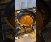 A person was preparing their Sunday breakfast, a pancake. Sadly, when they tried flipping the pancake, it accidentally slipped and some fell out of the pan. They eventually cleaned the counter and prepared a plate with all they had.