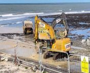 Clearing work continues on Aberaeron beach from flowina beach yoga