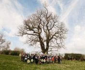 101 people gathered at the historic &#39;Darwin Oak&#39; for a world record attempt for the most people dressed as Charles Darwin at once.