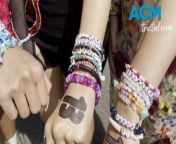 Swifties, Taylor Swift fans, exchange friendship bracelets with each other at the Melbourne show.&#60;br/&#62;&#60;br/&#62;