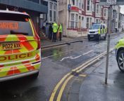 Heavy police presence in Blackpool as armed officers and police dog unit block street.