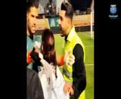 An Iranian goalkeeper has been handed a fine and one-match suspension after hugging a female fan, who was being chased by security for reportedly not wearing the compulsory hijab.&#60;br/&#62;&#60;br/&#62;Hossein Hosseini, goalkeeper for Esteghlal - one of the top teams in Iran - has been reprimanded by the Iranian football federation after he embraced a fan who had made her way to the side of the pitch. &#60;br/&#62;&#60;br/&#62;Hijabs, or headscarves, have been compulsory for women in Iran since the 1979 revolution, enforcing what is widely considered by many Muslim women around the world to be a matter of choice.&#60;br/&#62;&#60;br/&#62;Footage shows the moment when the fan made her way onto the pitch with her hair showing after her hijab had fallen, where she was accosted by security. &#60;br/&#62;&#60;br/&#62;Hosseini can then be seen making his way over and appearing to gesture for the security to step away as there was no danger and embraced the fan. &#60;br/&#62;&#60;br/&#62;However further security guards then raced to the scene and pulled Hosseini away from the supporter and escorted him off the pitch while a small scuffle broke out. &#60;br/&#62;&#60;br/&#62;Fans in the stands appeared to throw objects at security as they escorted Hosseini away and seemed to applaud the fans and Hosseini as he left the field under escort. &#60;br/&#62;&#60;br/&#62;According to reports, spectators continued to seemingly gesture angrily and allegedly chant &#39;shame on you&#39; at the security guards as they remained on the field. &#60;br/&#62;&#60;br/&#62;After Hosseini had been guided away from the field, several of his Esteghlal teammates approached the scene, one of whom gave the fan his shirt. &#60;br/&#62;&#60;br/&#62;The fan then ran towards a corner of the ground that seemed predominantly made up of female supporters, whirling the shirt above her head in celebration as the rest of the stadium cheered her back to her seat as she pulled her hijab back on. &#60;br/&#62;&#60;br/&#62;According to Iranian publication Khabar Varzeshi, Hosseini - who has played 11 times for the national team - was handed a fine of around £3,800 and a ban for one game for his actions, which were reportedly deemed &#39;unprofessional and beyond the legal duties of a player&#39;.&#60;br/&#62;&#60;br/&#62;The Esteghlal captain then reportedly made a public comment after being called into the federation disciplinary committee to explain himself, allegedly saying: &#39;I will pay the fine, for the sake of that lady&#39;. &#60;br/&#62;&#60;br/&#62;Yet reports suggest that these comments did not go down well, with the IRNA - Iran&#39;s official news agency - reporting that Hosseini could face a further penalty due to his public comments.