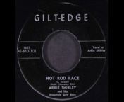 Arkie Shibley’s 1951 hit “Hot Rod Race” describes a race in San Pedro, Los Angeles, between two hot rod cars, a Ford and a Mercury, which stay neck-and-neck until both are overtaken by a kid in a hopped-up Model A.&#60;br/&#62;&#60;br/&#62;Song by George Wilson.&#60;br/&#62;&#60;br/&#62;SOME LYRICS: &#60;br/&#62;Now along about the middle of the night&#60;br/&#62;We were ripping along like white folks might.&#60;br/&#62;&#60;br/&#62;The song ends with:&#60;br/&#62;&#60;br/&#62;When it flew by us, I turned the other way.&#60;br/&#62;The guy in Mercury had nothing to say,&#60;br/&#62;For it was a kid, in a hopped-up Model A.&#60;br/&#62;&#60;br/&#62;&#92;